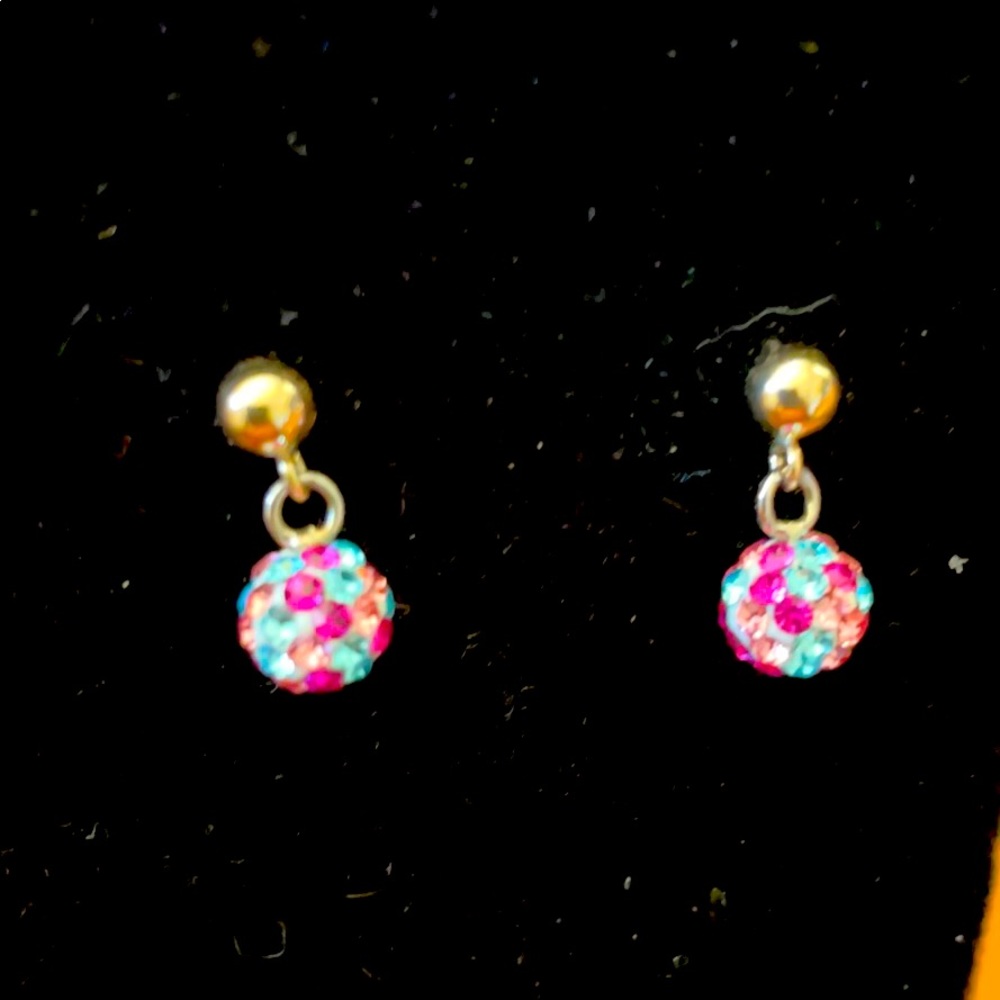 Gold and crystal stud earrings.